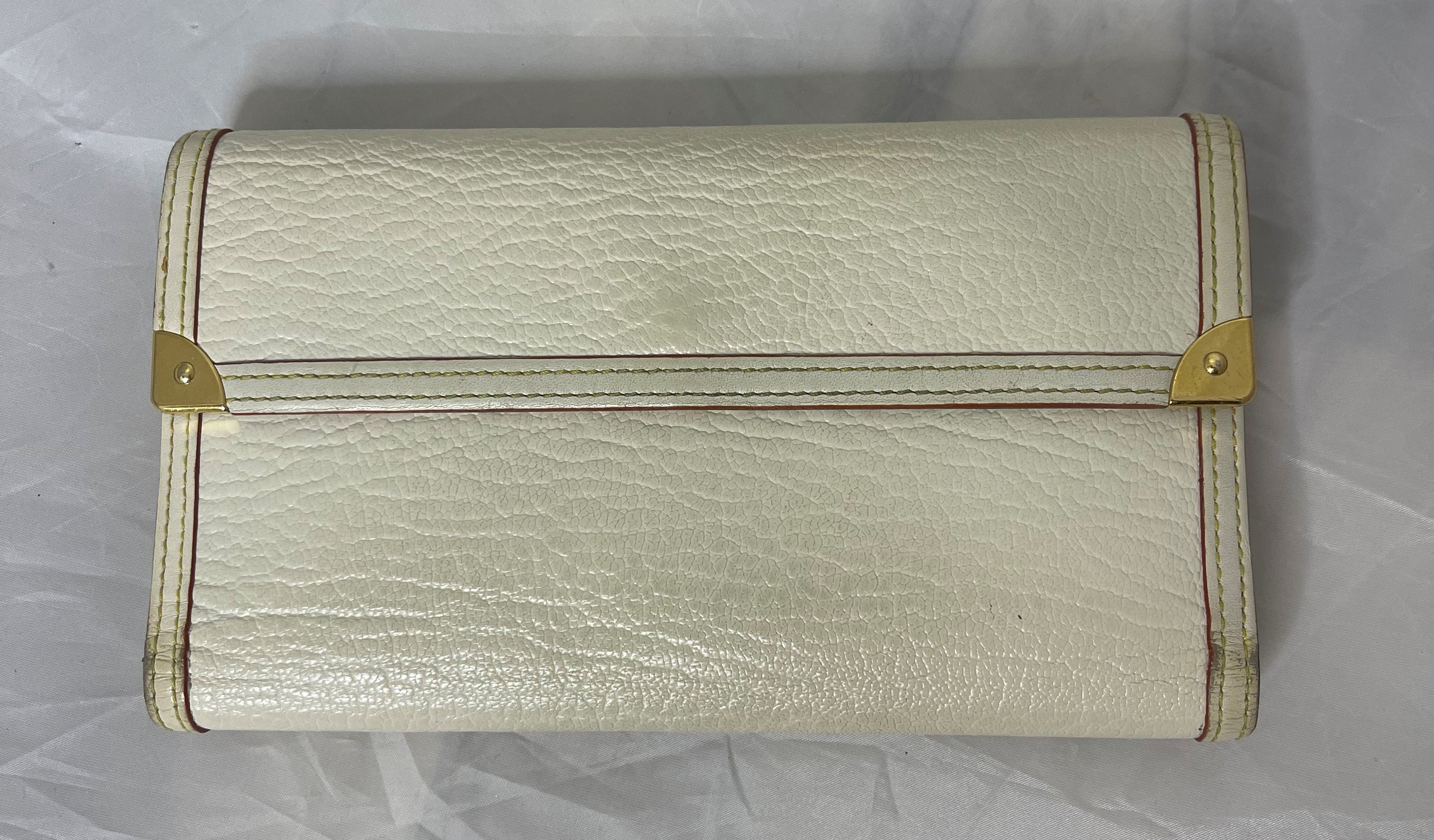 Louis Vuitton Suhali Cream/White & red border international wallet –  TheLuxeLouis